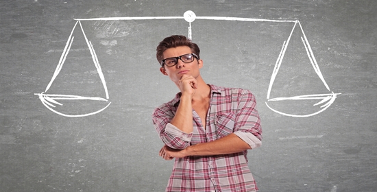 confused young man pondering all the choices before making a decision